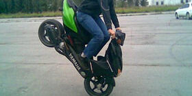 Как поднять заднее колесо фото