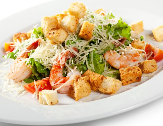 Caesar Salad with Seafood. Comprises Romaine Salad Leaf and Croutons Dressed with Parmesan Cheese